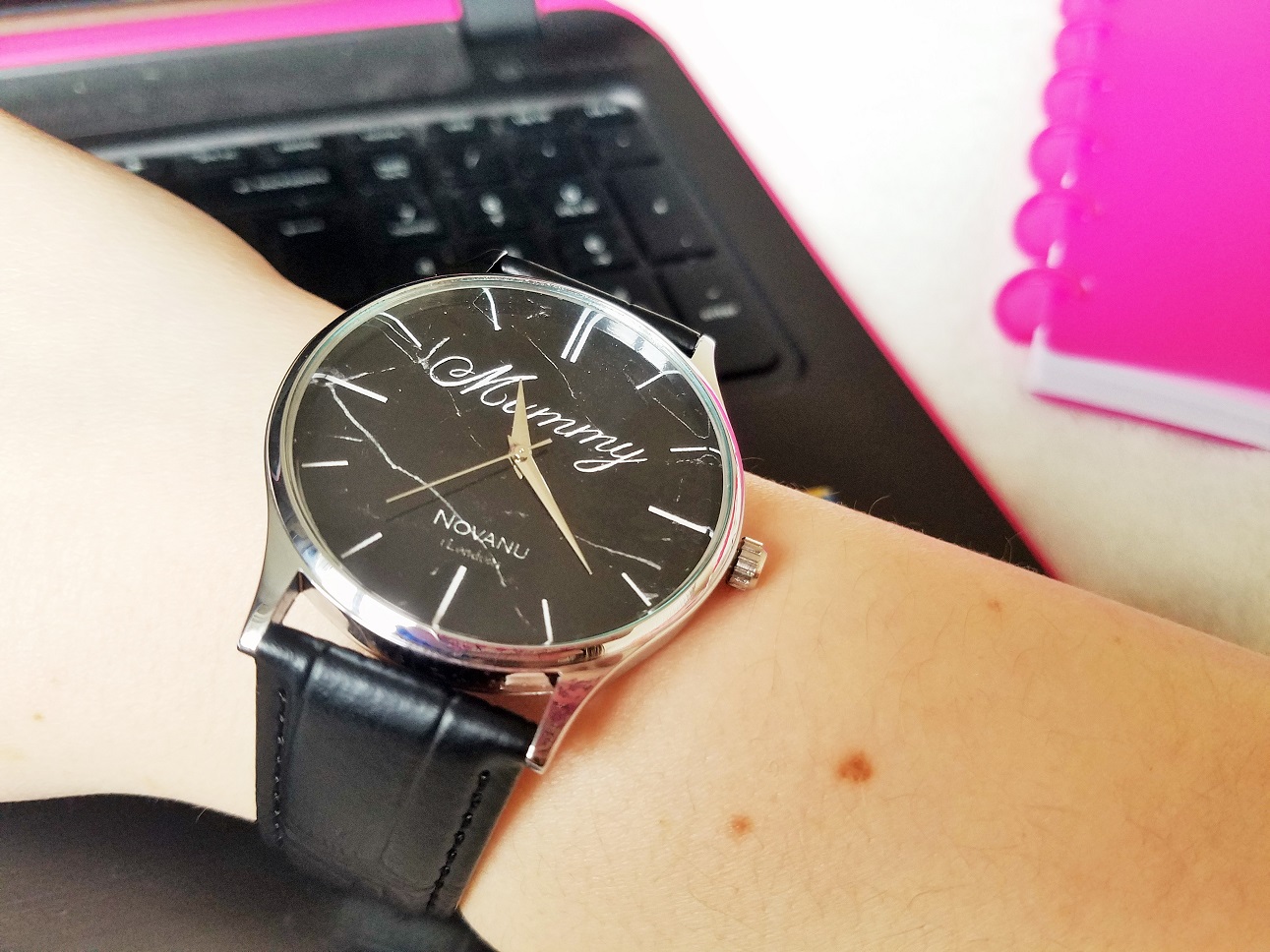 Novanu London Watch - wrist watch and laptop
